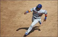  ?? PATRICK SEMANSKY - THE ASSOCIATED PRESS ?? New York Mets’ Robinson Cano runs to third base on J.D. Davis’ double in the sixth inning of a baseball game against the Washington Nationals, Wednesday, Sept. 4, 2019, in Washington.