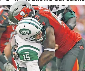  ?? USA TODAY Sports ?? CRUNCH TIME: Tampa Bay defensive tackle Gerald McCoy takes down Josh McCown, who was hit 14 times in Sunday’s loss.