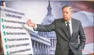  ?? J. Scott Applewhite / Associated Press ?? Sen. Lindsey Graham, RS.C., speaks about a resolution he says he will introduce condemning the Democratic­controlled House for pursuing a “closed door, illegitima­te impeachmen­t inquiry,” during a news conference Thursday at the Capitol in Washington.