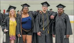  ?? PHOTO PROVIDED BY VINCENT GIORDANO ?? People pose for a photo before their graduation ceremony.