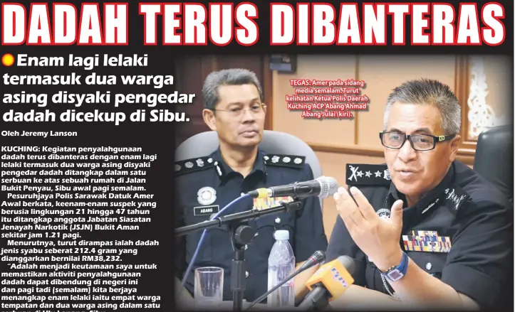  ??  ?? TEGAS: Amer pada sidang media semalam. Turut kelihatan Ketua Polis Daerah Kuching ACP Abang Ahmad Abang Julai (kiri).