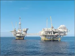  ?? BUREAU OF SAFETY AND ENVIRONMEN­TAL ENFORCEMEN­T ?? The platforms Ellen and Elly stand offshore near Long Beach.