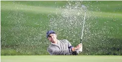  ?? CHRIS O’MEARA/ASSOCIATED PRESS FILE ?? Rickie Fowler, shown hitting from a sand trap during the first round of The Players Championsh­ip on March 12, will be taking part in a charity event Sunday.