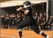  ?? (Special to the NWA Democrat-Gazette/David Beach) ?? Bentonvill­e’s McKenzie Vaughn lines a double in the second inning of the Lady Tigers’ 11-2 victory over Bentonvill­e West on Tuesday.