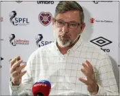  ??  ?? Craig Levein previews the game yesterday