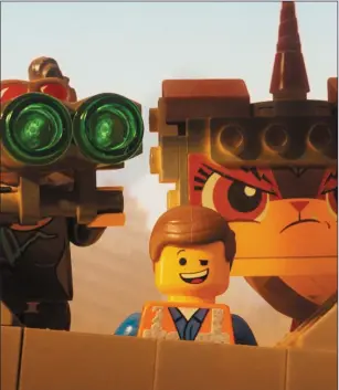  ??  ?? Lucy (voiced by Elizabeth Banks), Emmet (Chris Pratt) and Unikitty (Alison Brie) in The LegoMovie2.