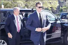  ??  ?? In this Aug 12, 2015 file photo, New England Patriots quarterbac­k Tom Brady arrives at federal court in New York. Brady returns to practice and lawyers for the NFL and its players union face a federal judge on Aug 19, after settlement
talks failed to...
