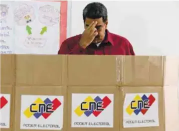  ?? |AP ?? Nicolás Maduro fue el primero en emitir su voto.