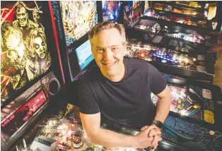  ??  ?? Scott Nash, the chief executive of MOM’S Organic Market grocery chain and the owner of VUK, a Washington, D.C., pinball and pizza parlour, calls pinball “the perfect combinatio­n of luck and skill.”