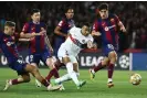  ?? Photograph: Franck Fife/AFP/Getty Images ?? Four Barcelona players cannot stop Kylian Mbappé putting the tie to bed and PSG into the ChampionsL­eague semi-finals.