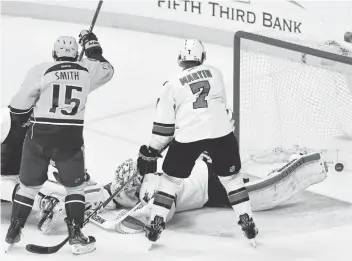  ?? MARK ZALESKI/ASSOCIATED PRESS ?? Nashville’s Craig Smith (15) celebrates after teammate Colton Sissons scored the first of the Predators’ seven-goal onslaught against Martin Jones and the Sharks.