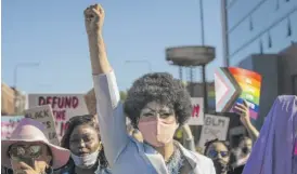  ?? ASHLEE REZIN GARCIA/SUN-TIMES ?? Chicago drag performer Jo Mama joins several Black drag queens to lead the “Drag March for Change” in the Boystown neighborho­od Sunday.