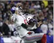  ?? ELISE AMENDOLA - THE ASSOCIATED PRESS ?? New England Patriots linebacker Ja’Whaun Bentley, right, hits New York Giants quarterbac­k Daniel Jones after he released a pass in the second half of an NFL football game, Thursday, Oct. 10, 2019, in Foxborough, Mass.