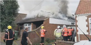  ??  ?? Firefighte­rs tackling the blaze in Fletton