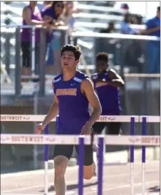  ??  ?? Southwest High’s Tyler Saikhon competes in the boys’ 110-meter hurdles event during their home track-and-field meet against Central Union High on Thursday in El Centro. Saikhon won the boys’ 110-meter hurdles with a time of 14.98 seconds, as well as...