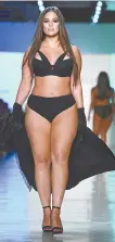  ?? AFP-Yonhap ?? Model Ashley Graham walks the runway for Addition Elle during the New York Fashion Week, Monday.