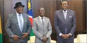  ?? Photo: Emmency Nuukala ?? Submitted... President Hage Geingob received a report from Urban and Rural Developmen­t Minister Erastus Uutoni and chairperso­n of the Council of Traditiona­l Leaders Immanuel /Gaseb.