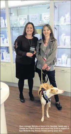  ??  ?? Store manager Nichola at Grace & Co, Hinckley, hands over a cheque for £198 to Tracey and rescue dog Scout in support of East Midlands Dog Rescue Picture sent by Grace &Co