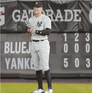  ?? AP PHOTO ?? ALL RIGHT AGAIN: Aaron Judge stands in the field after going in as a defensive replacemen­t as the Yankees rolled over the Blue Jays last night.