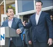  ?? Kent Nishimura Los Angeles Times ?? ANTONIO Villaraigo­sa, left, with Gavin Newsom at Homegirl Cafe in L.A., drew primary voters seeking two Democrats in the general election, the poll found.