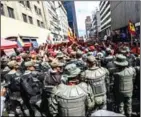  ?? AFP ?? Members of the national guard remain outside the National Assembly during a protest by Venezuelan President Nicolas Maduro in Caracas on Tuesday.