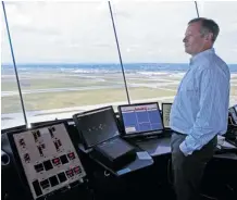  ?? Stuart Gradon/calgary Herald/files ?? Wayne Nyman is manager of the Calgary Tower at the city’s internatio­nal airport. Developmen­ts in and around the terminal will make it one of the most efficient airports in the world.