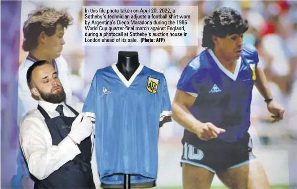  ?? (Photo: AFP) ?? In this file photo taken on April 20, 2022, a Sotheby’s technician adjusts a football shirt worn by Argentina’s Diego Maradona during the 1986 World Cup quarter-final match against England, during a photocall at Sotheby’s auction house in London ahead of its sale.