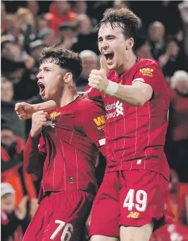  ?? Picture: Reuters ?? YOUNG GUNS. Liverpool’s Neco Williams (left) and Liam Millar celebrate after Shrewsbury Town’s Ro-Shaun Williams scored an own goal during their FA Cup fourth round replay at Anfield on Tuesday.