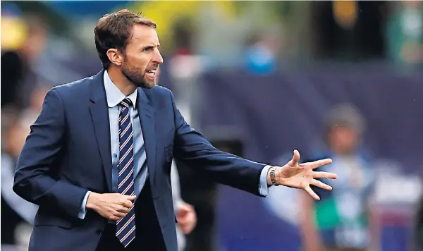  ??  ?? Single-minded: Gareth Southgate has never looked like someone prepared to take a job at all costs