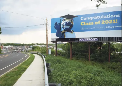  ?? Arnold Gold / Hearst Connecticu­t Media file photo ?? A billboard congratula­tes University of New Haven graduates on Route 1 South looking toward new developmen­t in the Allingtown section of West Haven in May.