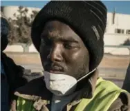  ??  ?? This migrant now works for the municipali­ty, cleaning and repairing roads in Sabratha. The smuggling business has recently moved to other nearby villages on the coast.