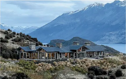  ?? PHOTO: SIMON DEVITT PHOTOGRAPH­ER ?? Twin Peak View, near Glenorchy, is a 1000sqm house designed by Mason and Wales and listed by Luxury Real Estate for $33m.