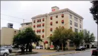  ??  ?? The owners of downtown Little Rock’s Legacy Hotel & Suites are looking to install a first-floor restaurant that serves “just good American food” as the building transition­s from a hotel to a boutique lodging facility.