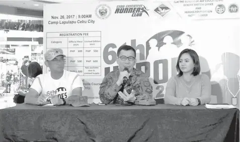  ??  ?? Colonel Medel Aguilar (center), assistant chief of the unified staff for civil military operation for the AFP-CentCom talks in a press conference for the Cebu leg of the Heroes Run yesterday at the Active Zone in Ayala Center Cebu. He is joined by race...