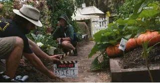  ??  ?? right: in Sydney’s Centennial Park, a vegetable garden set is readied for filming