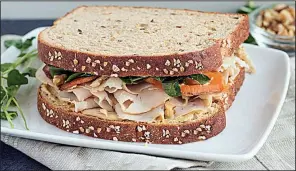  ?? Handout photo ?? Orange Kissed Turkey, Sweet Potato and Watercress Salad Sammie by Tiffany Aaron of Quitman