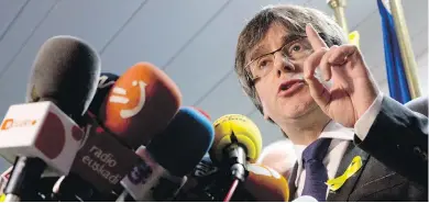  ?? VIRGIN MAYO, AP ?? Ousted Catalan leader Carles Puigdemont speaks during a news conference in Brussels on Friday.