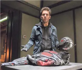  ??  ?? Ex-con dad Scott Lang (Paul Rudd) steals a suit that changes his life in “Ant-Man.” His small hero has a big impact on the Marvel Universe. PHOTOS BY MARVEL