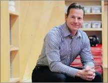  ?? Colleen De Neve, Calgary Herald ?? Martin Gelinas relaxes in the locker room after he was introduced as the Flames’ new assistant coach during a news conference Thursday.