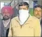  ??  ?? ASI Mool Raj in vigilance bureau custody in Ludhiana on Thursday. HT PHOTO