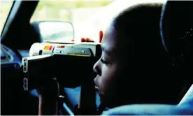  ??  ?? Emmanuel Durant taking videos in 17 Blocks. Photograph: Davy Rothbart courtesy of MTV Documentar­y Films