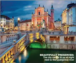  ??  ?? BEAUTIFULL­Y PRESERVED: The city centre lit up at night next to the Ljubljanic­a river