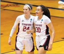  ?? STEPHEN SPILLMAN / AP ?? Stanford guard Lacie Hull (24) and guard Haley Jones smile after a score against Oklahoma State during the second half of Tuesday’s second round of the NCAA women’s tournament in San Antonio.