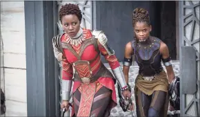  ?? Matt Kennedy / Associated Press ?? Lupita Nyong’o, left, and Letitia Wright in a scene from Marvel Studios’ “Black Panther.”