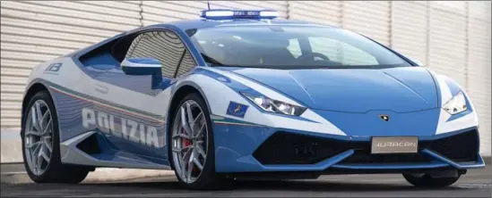  ??  ?? In Italy, you can run but you can’t hide from the newest Lamborghin­i police highway patrol car.