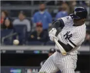  ?? FRANK FRANKLIN II — ASSOCIATED PRESS FILE ?? Yankees shortstop Didi Gregorius connects for a grand slam home run against Twins during the American League Division Series in New York on Oct. 5. Gregorius is eligible for free agency and may not be back with the Bombers next season.