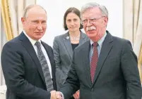  ?? ALEXANDER ZEMLIANICH­ENKO THE ASSOCIATED PRESS ?? Russian President Vladimir Putin and U.S. national security adviser John Bolton met at the Kremlin in Russia on Tuesday.