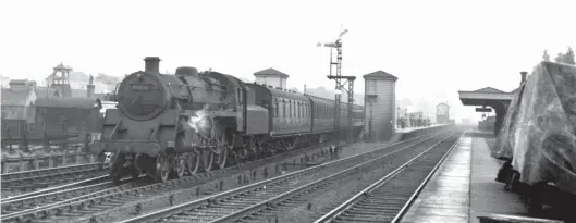  ?? H C Casserley ?? Between June and August 1953 Bletchley received a batch of new BR Standard ‘4MT’ 4-6-0s, Nos 75030-39, which displaced a similar number of ‘Black Fives’, to Willesden, Crewe and Carlisle (Upperby). They were put to work on the outer-suburban services to Euston, as well as on the Oxford to Cambridge line, the Northampto­n line, and parcels traffic to and from Marylebone. On 18 May 1954 No 75038 gets away from Bushey station with the 6.12pm Euston to Bletchley service. As Table Three/Run 5 shows, the ‘4MT’ 4-6-0s were more than capable performers on the semi-fasts, despite reports of indifferen­t steaming that led to a number of the class receiving double blast pipes and chimneys.