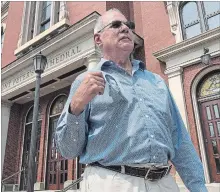  ?? MICHAEL RUBINKAM THE ASSOCIATED PRESS ?? Tim Lennon of the Survivors Network of those Abused by Priests stands outside the Cathedral of Saint Peter in Scranton, Pa., on Monday.