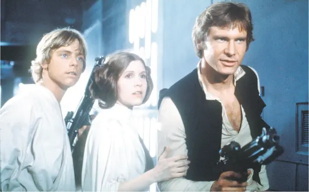  ??  ?? Mark Hamill as Luke Skywalker, Carrie Fisher as Princess Leia and Harrison Ford as Han Solo in the original Star Wars.